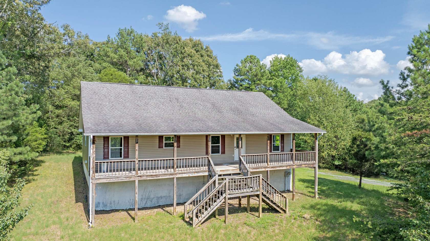 7.9 Acres of Land with Home for Sale in Dayton, Tennessee