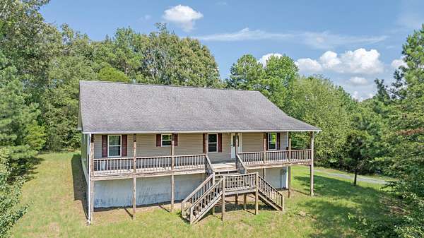 7.9 Acres of Land with Home for Sale in Dayton, Tennessee