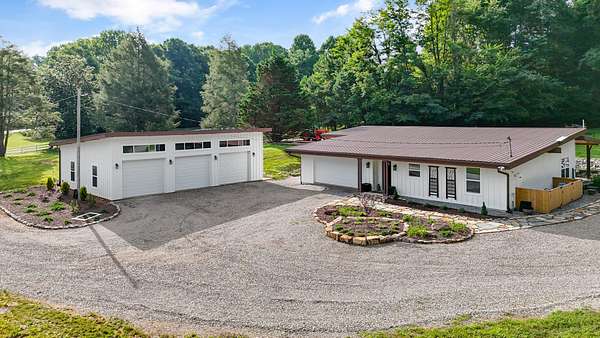 86.9 Acres of Land with Home for Sale in Englewood, Tennessee