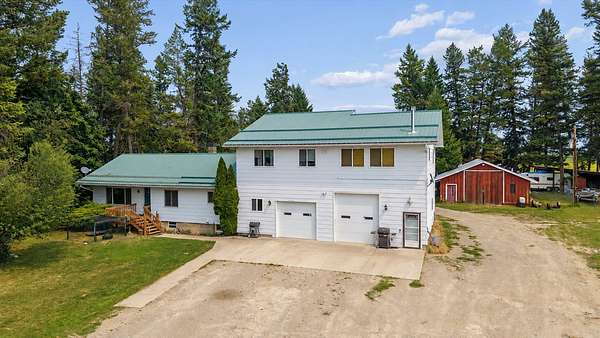 31.5 Acres of Agricultural Land with Home for Sale in Kalispell, Montana