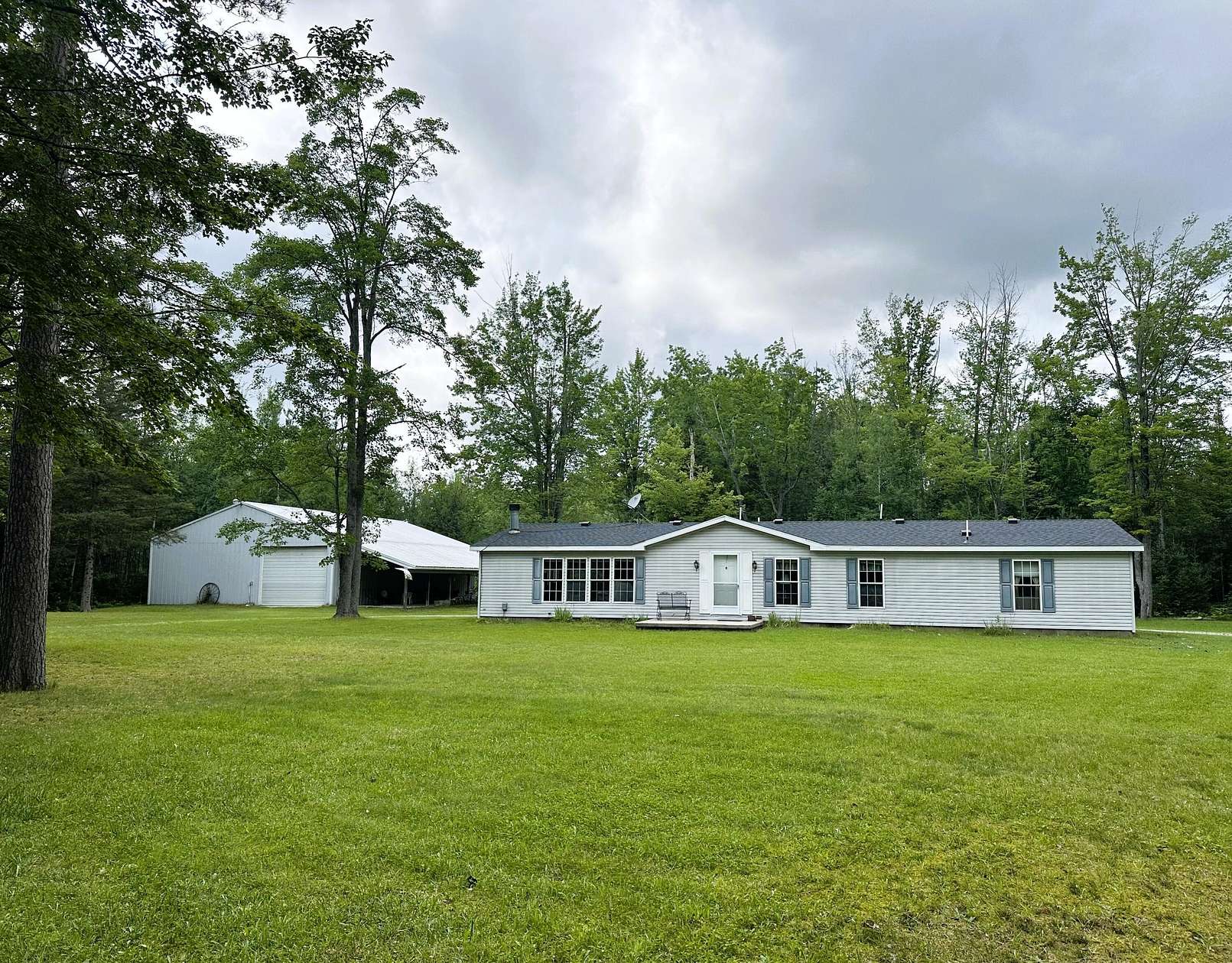 40 Acres of Recreational Land with Home for Sale in Atlanta, Michigan