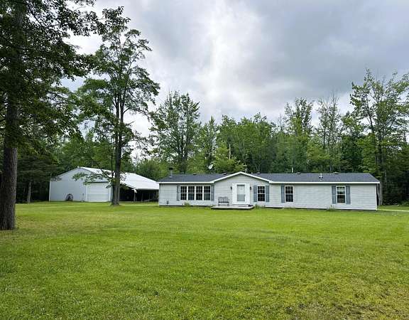 40 Acres of Recreational Land with Home for Sale in Atlanta, Michigan