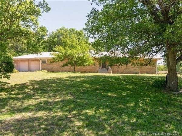 4.66 Acres of Land with Home for Sale in Nowata, Oklahoma