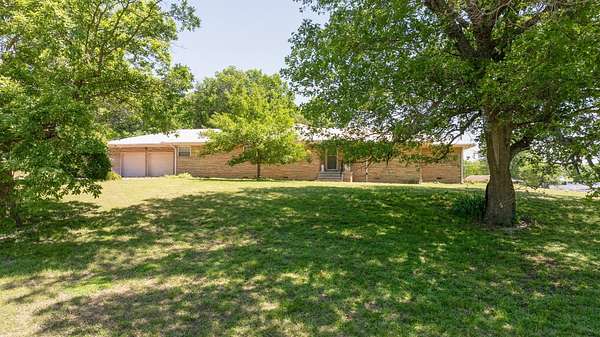 4.66 Acres of Land with Home for Sale in Nowata, Oklahoma