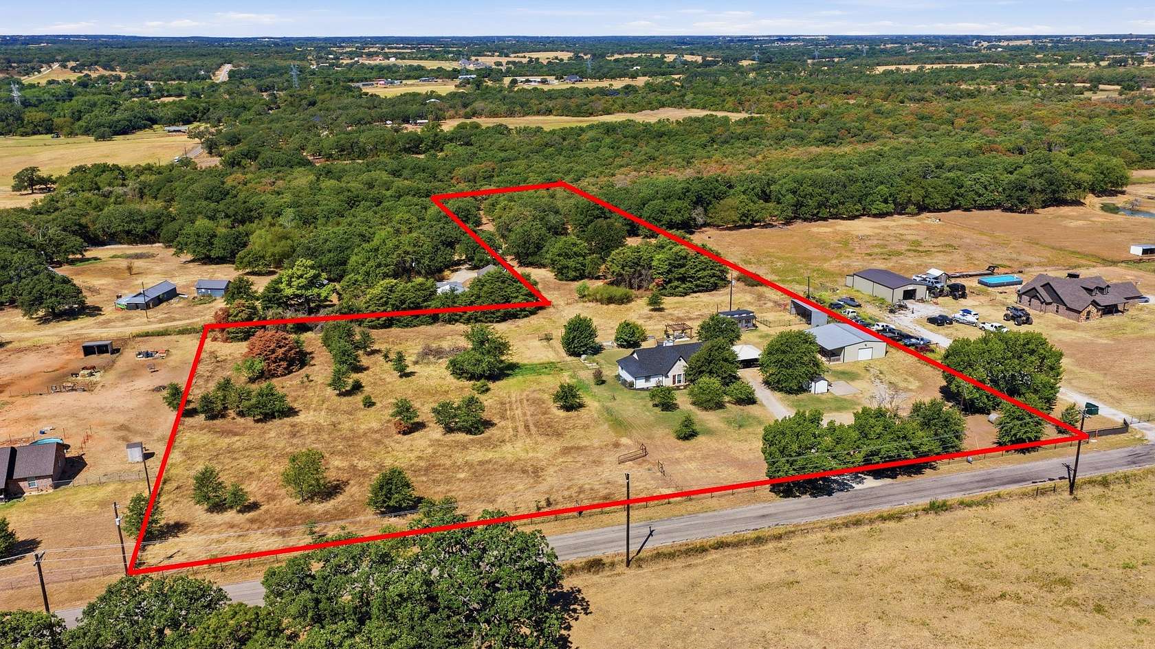5 Acres of Land with Home for Sale in Springtown, Texas