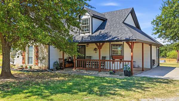 5 Acres of Land with Home for Sale in Springtown, Texas
