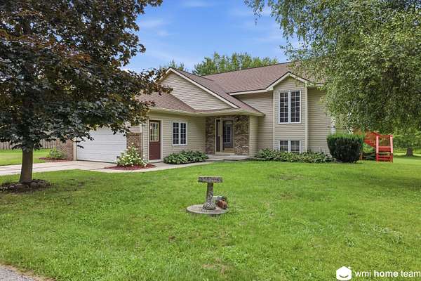 3.76 Acres of Land with Home for Sale in Rockford, Michigan