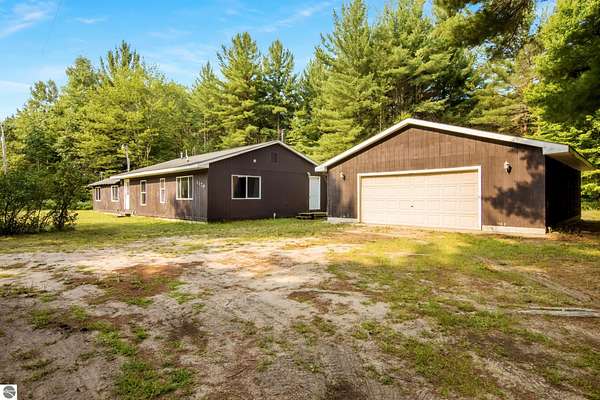 10 Acres of Recreational Land with Home for Sale in Kalkaska, Michigan