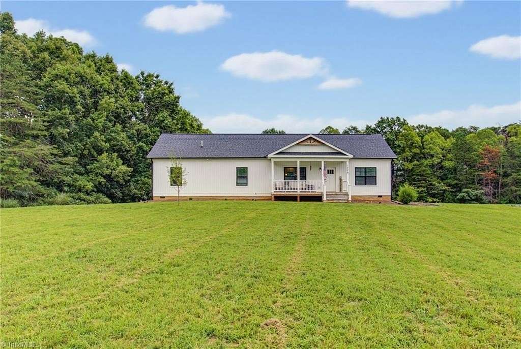 11.9 Acres of Land with Home for Sale in King, North Carolina