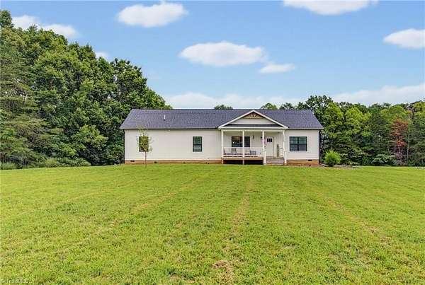 11.9 Acres of Land with Home for Sale in King, North Carolina