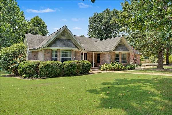 4 Acres of Land with Home for Sale in Gravette, Arkansas