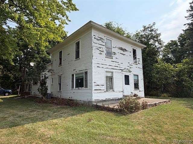 6.8 Acres of Land with Home for Sale in Groveland Township, Michigan