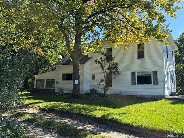 6.8 Acres of Land with Home for Sale in Groveland Township, Michigan