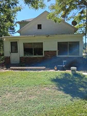 6.8 Acres of Land with Home for Sale in Groveland Township, Michigan