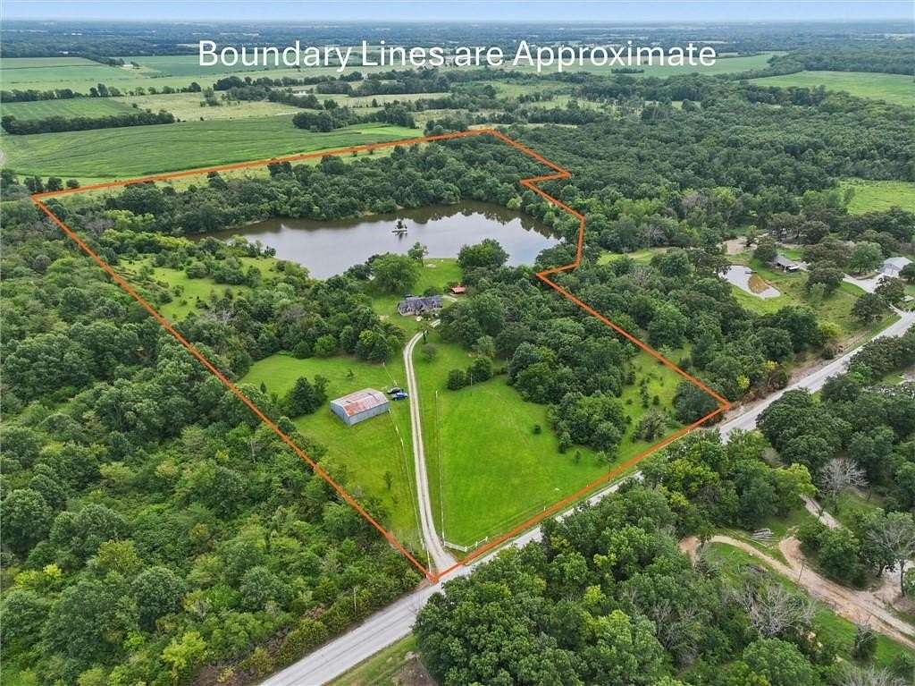 29.5 Acres of Recreational Land with Home for Sale in Pleasant Hill, Missouri