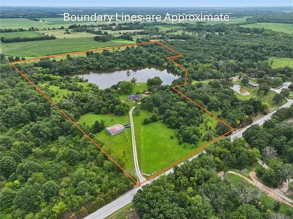 29.5 Acres of Recreational Land with Home for Sale in Pleasant Hill, Missouri
