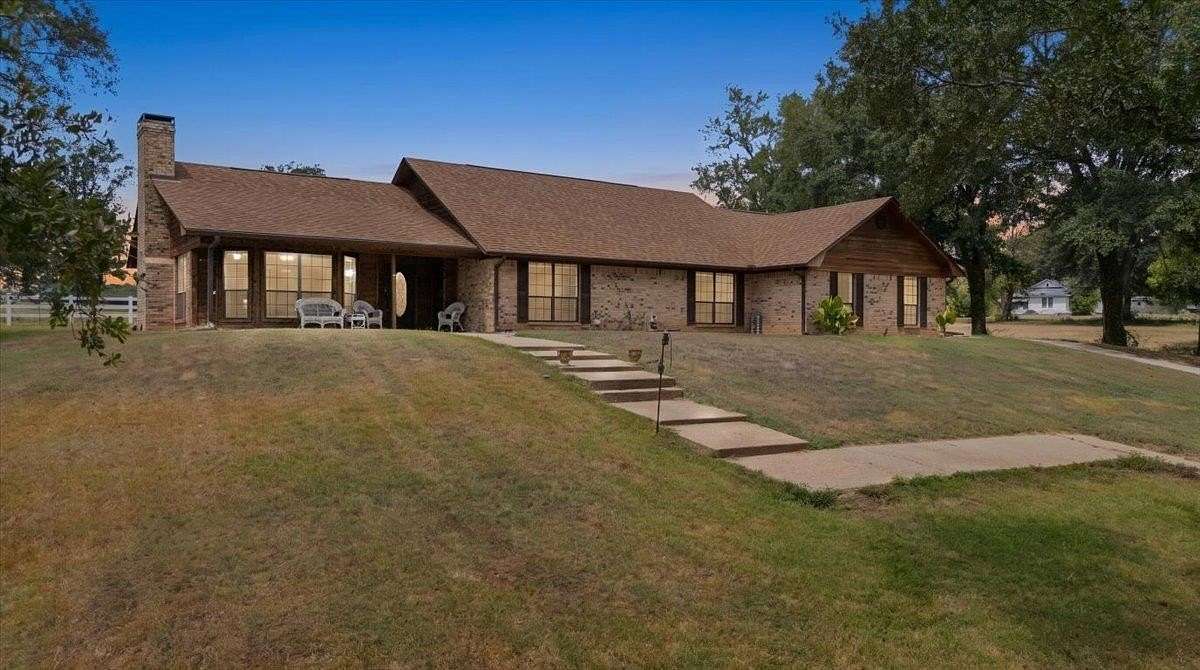 4.32 Acres of Land with Home for Sale in Overton, Texas