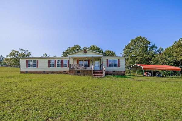 7.7 Acres of Land with Home for Sale in Moore, South Carolina