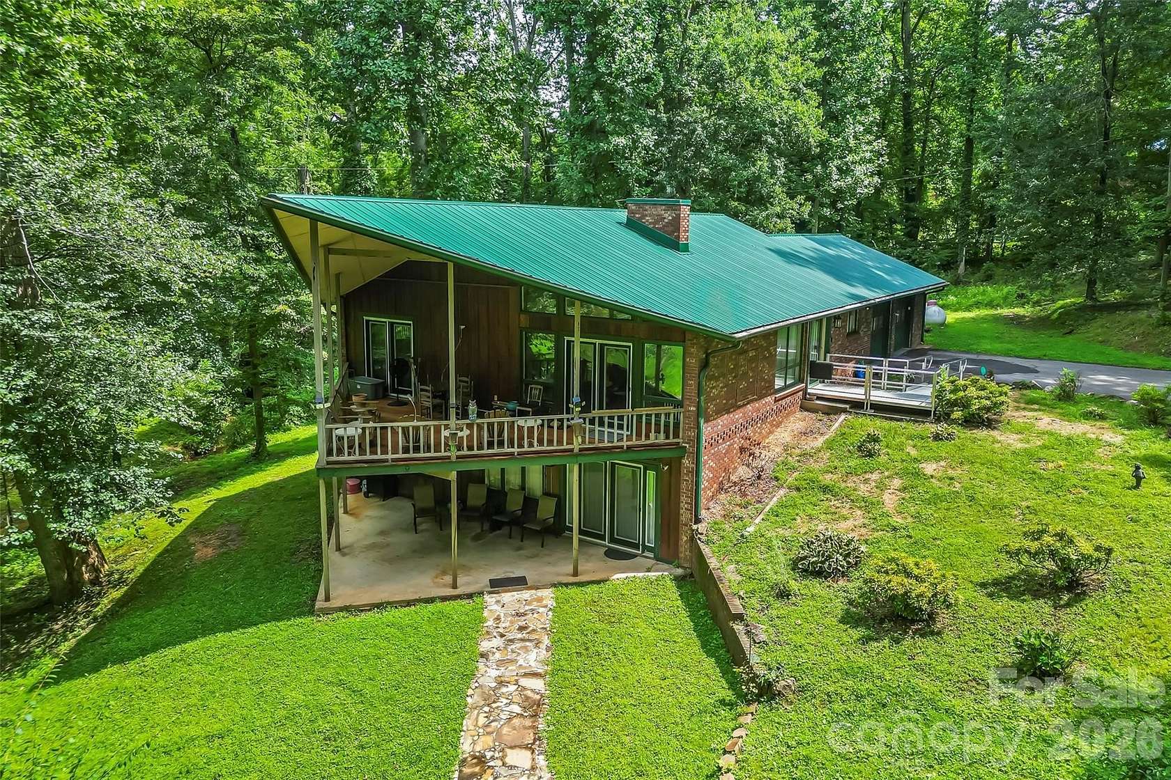 3.6 Acres of Land with Home for Sale in Candler, North Carolina
