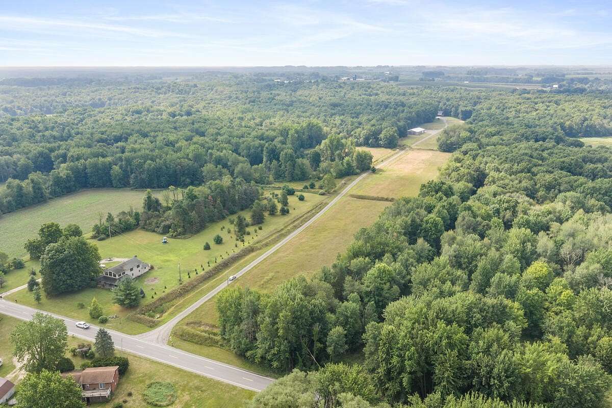 34 Acres of Land with Home for Sale in Kent City, Michigan