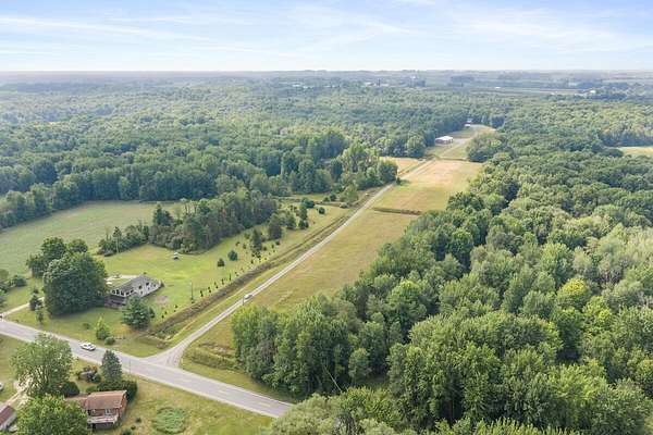 34 Acres of Land with Home for Sale in Kent City, Michigan