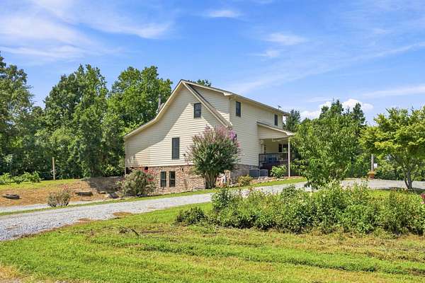 6.64 Acres of Land with Home for Sale in Ten Mile, Tennessee