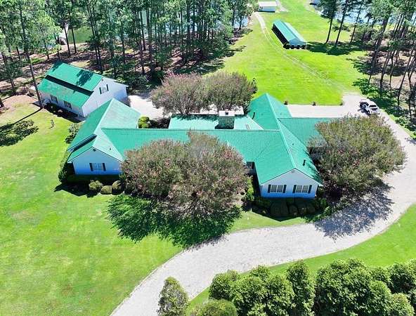 72.9 Acres of Recreational Land with Home for Sale in Pavo, Georgia