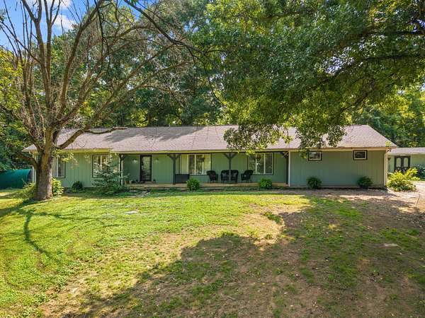 13.3 Acres of Land with Home for Sale in Versailles, Kentucky