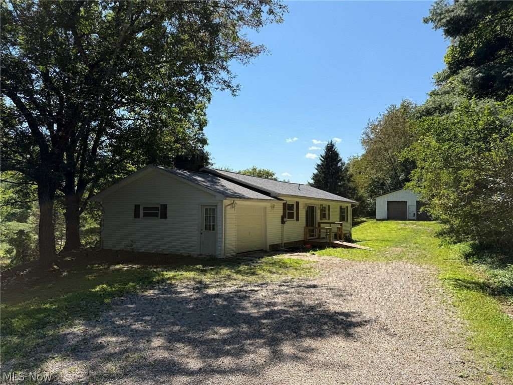8.66 Acres of Land with Home for Auction in Bowerston, Ohio