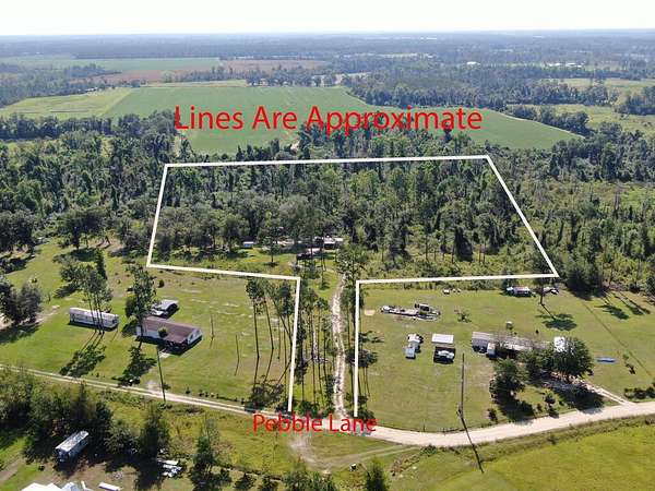 9.66 Acres of Land with Home for Sale in Pearson, Georgia