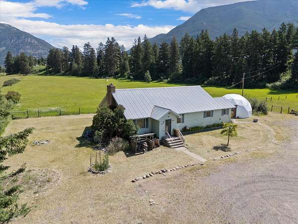 12.4 Acres of Land with Home for Sale in Columbia Falls, Montana