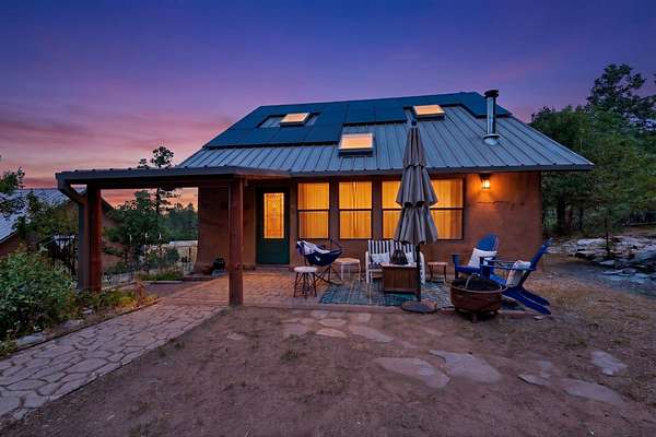 7.56 Acres of Land with Home for Sale in Glorieta, New Mexico