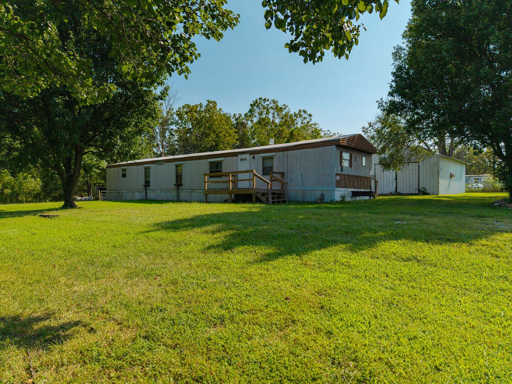 4.5 Acres of Land with Home for Sale in Halfway, Missouri