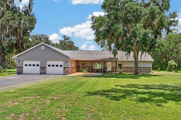 11.4 Acres of Land with Home for Sale in Micanopy, Florida