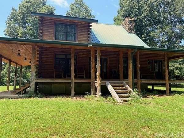 4.75 Acres of Land with Home for Sale in Maynard, Arkansas