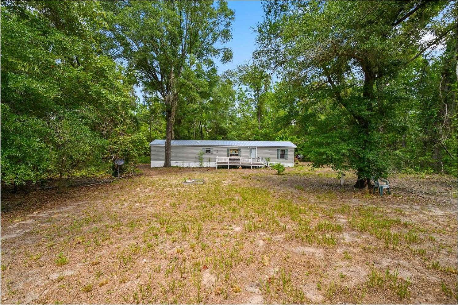 6.6 Acres of Land with Home for Sale in O'Brien, Florida