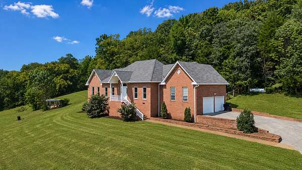 20.9 Acres of Land with Home for Sale in Bethpage, Tennessee