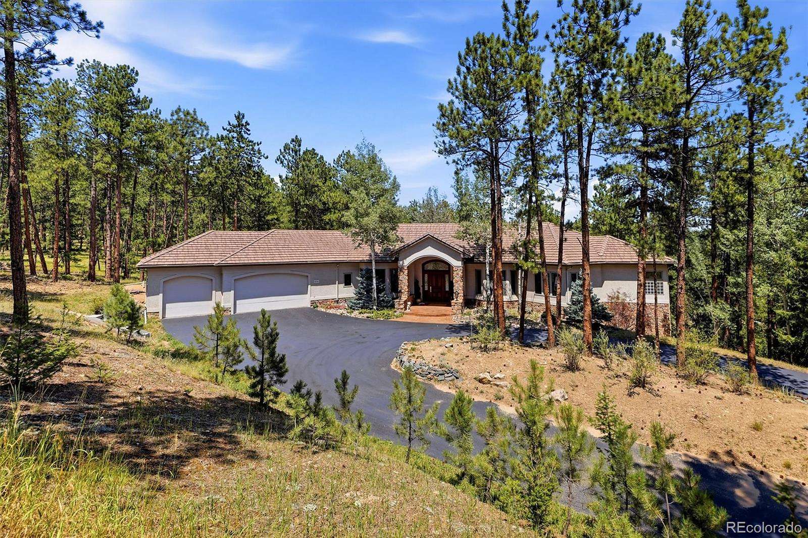 2.27 Acres of Land with Home for Sale in Evergreen, Colorado