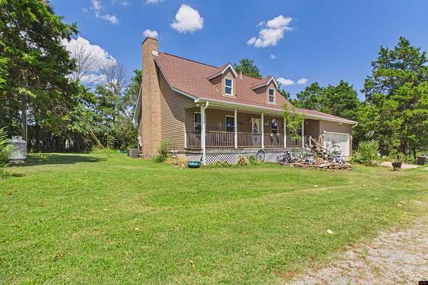 17 Acres of Land with Home for Sale in Mountain Home, Arkansas
