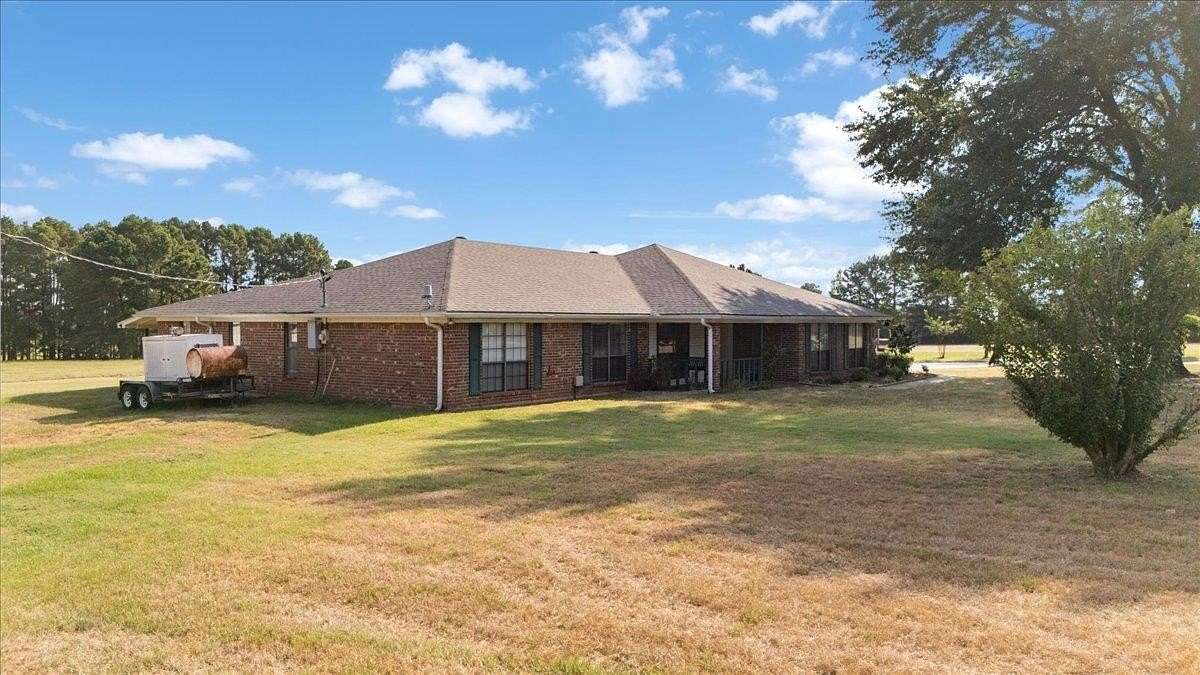 8.72 Acres of Land with Home for Sale in Gladewater, Texas