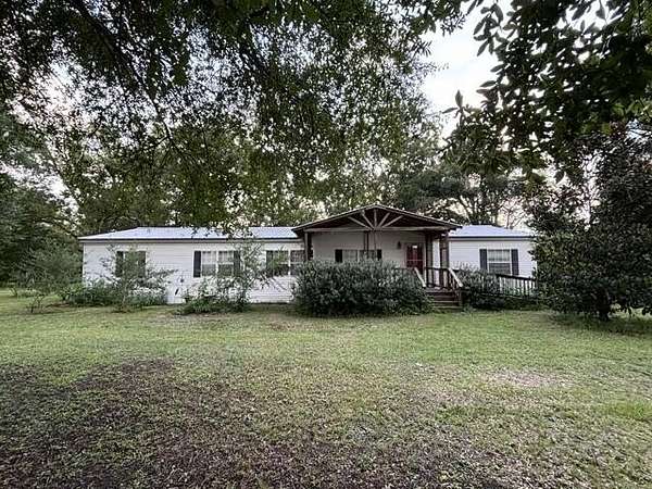 4.42 Acres of Land with Home for Sale in Trenton, Florida