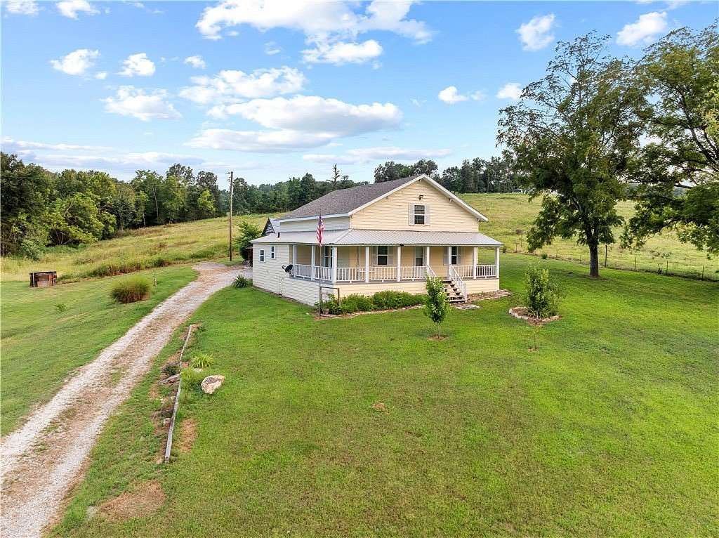 7.45 Acres of Land with Home for Sale in Harrison, Arkansas
