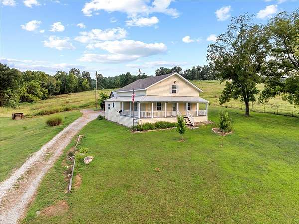 7.45 Acres of Land with Home for Sale in Harrison, Arkansas