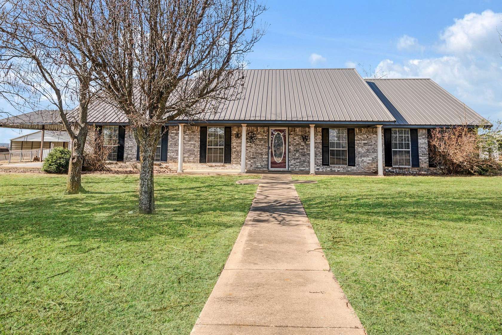 5 Acres of Land with Home for Sale in Paris, Texas
