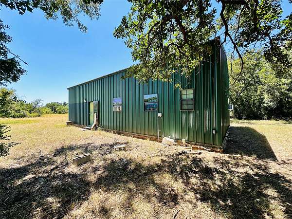 11 Acres of Recreational Land with Home for Sale in May, Texas