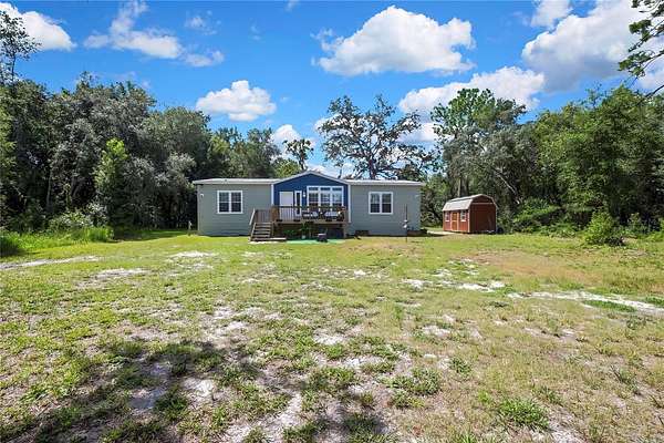 1.5 Acres of Land with Home for Sale in Spring Hill, Florida