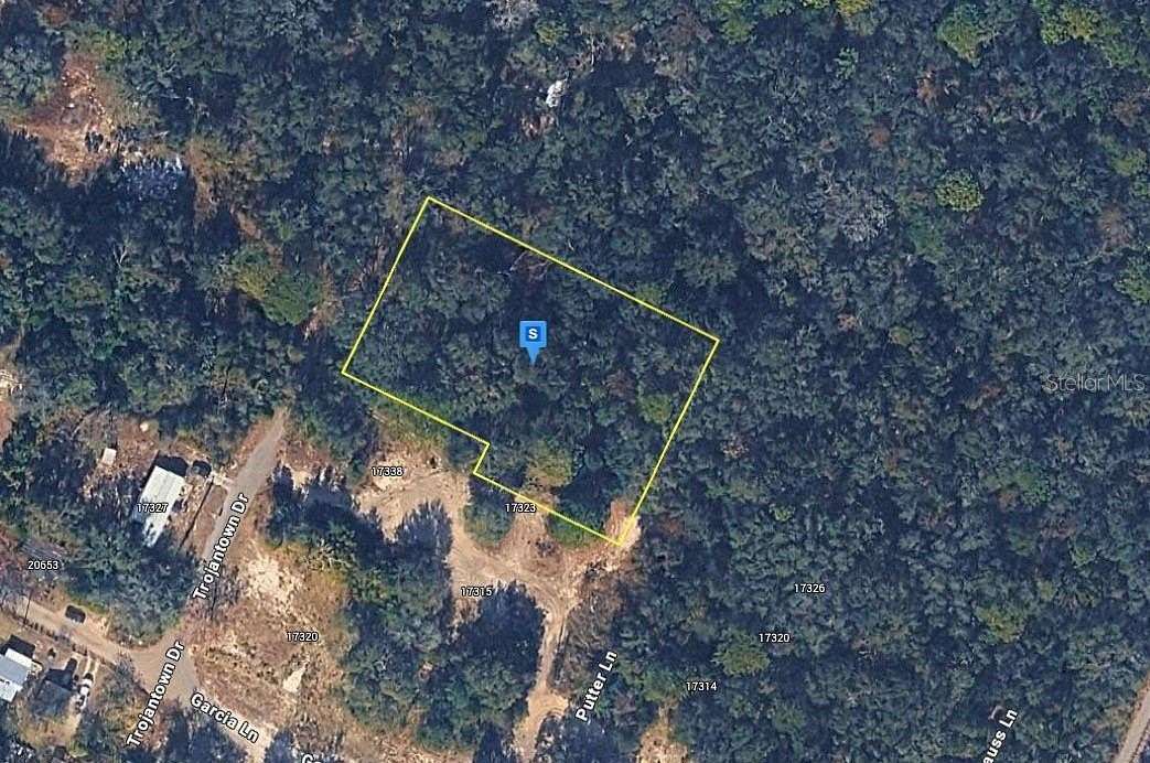 0.93 Acres of Residential Land for Sale in Spring Hill, Florida