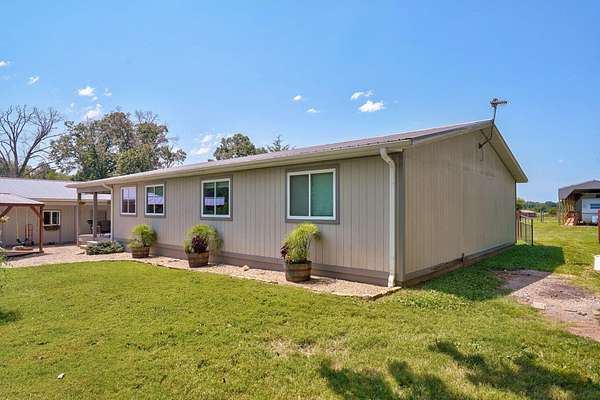 3.76 Acres of Land with Home for Sale in Sparta, Missouri