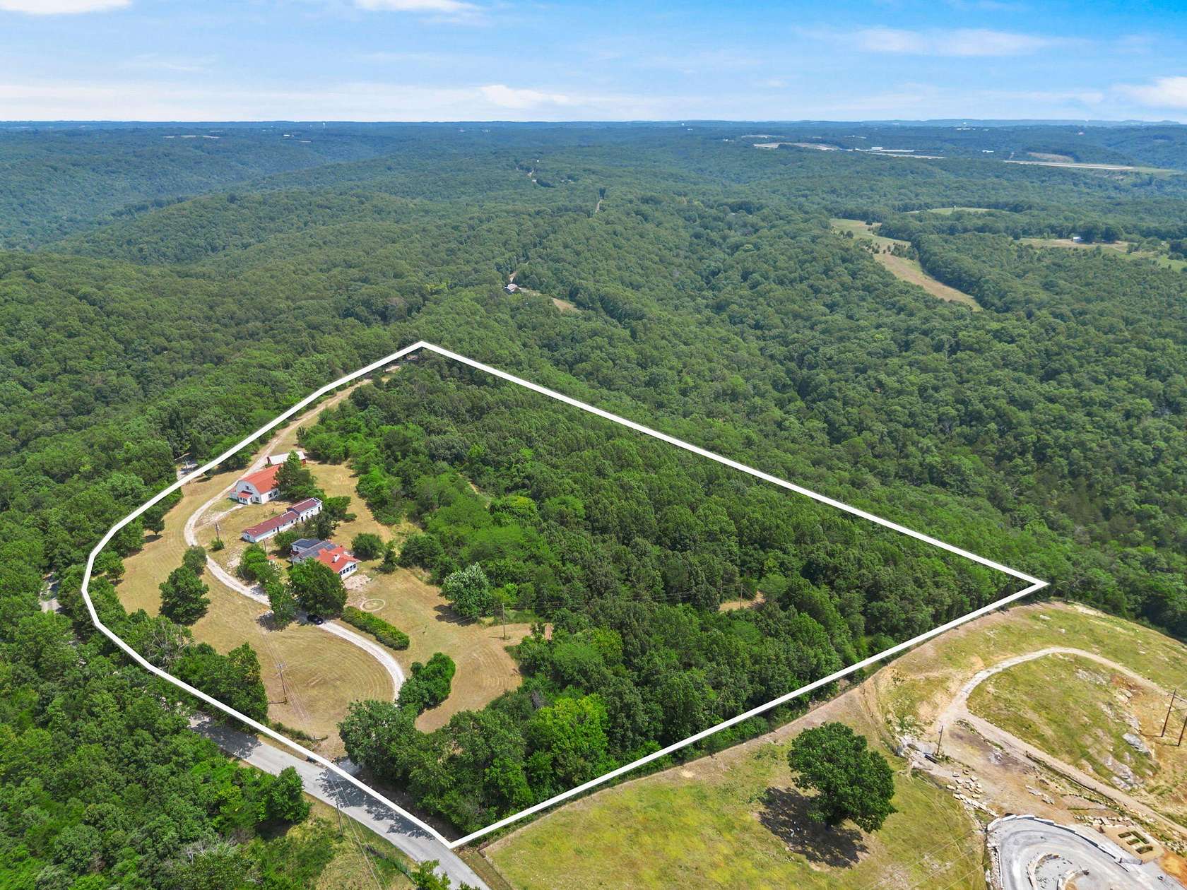 17.7 Acres of Land with Home for Sale in Branson West, Missouri