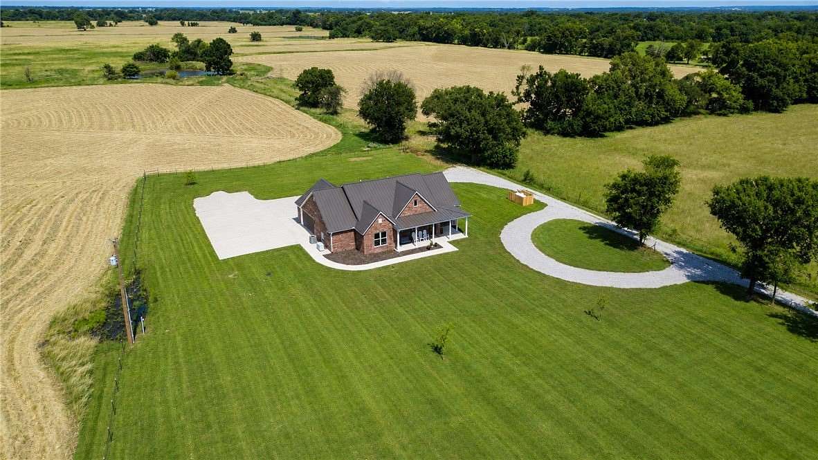 35 Acres of Agricultural Land with Home for Sale in Maysville, Arkansas